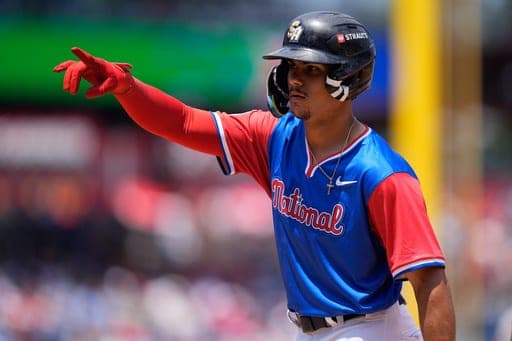 FILE - National League's Ethan Salas reacts to hitting a single during the second inning of the MLB All-Star Futures baseball game against the American League on July 12, 2026, in Philadelphia. (AP Photo/Chris Szagola, File) (AP Photo/Chris Szagola)