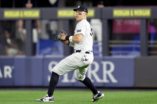 Aaron Judge throws gingerly in first outfield appearance since July 25, but insists arm is 100%