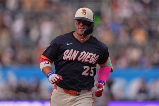 San Diego Padres' Ty France celebrates after hitting a two-run home run during the first inning of a baseball game against the Minnesota Twins Friday, Aug. 21, 2026, in San Diego. (AP Photo/Gregory Bull) (AP Photo/Gregory Bull)