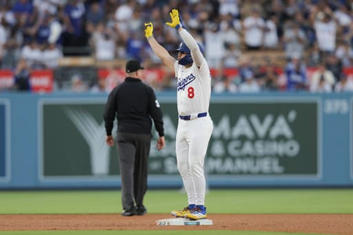 Clayton Kershaw wins 3rd straight start, Miguel Rojas homers in Dodgers’ 6-5 win over Nationals