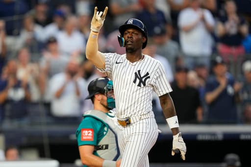 Chisholm homers twice and Schlittler wins MLB debut as Yankees top Mariners 9-6