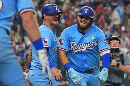 Burger and Jung get to Valdez as Rangers beat Astros 4-2 to keep pace in AL wild card