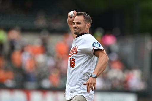 Baltimore Orioles' Trey Mancini throws the ceremonial first pitch after a retirement ceremony before the Baltimore Orioles and Milwaukee Brewers baseball game, Saturday, Sept. 19, 2026 in Baltimore. (AP Photo/Gail Burton) (AP Photo/Gail Burton)