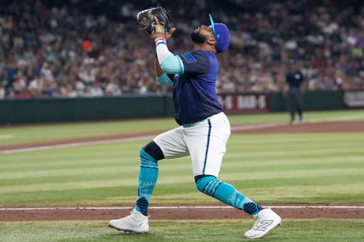 Diamondbacks put Carlos Santana on injured list with adductor strain, select Luken Baker