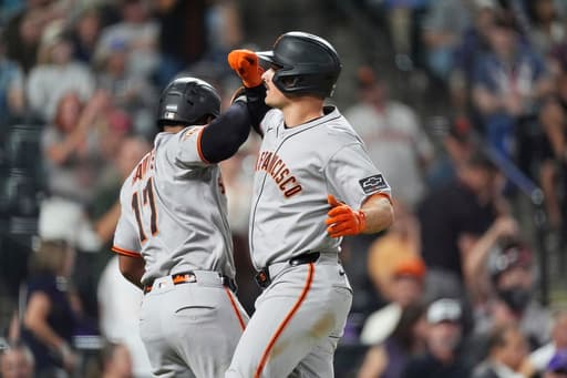 Chapman homers twice after appealing suspension to help the Giants beat the Rockies