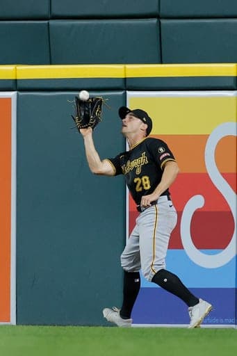 Pittsburgh Pirates right fielder Jake Mangum catches a fly ball hit by Detroit Tigers' Kevin McGonigle during the sixth inning of a baseball game Friday, Sept. 25, 2026, in Detroit. (AP Photo/Duane Burleson) (AP Photo/Duane Burleson)