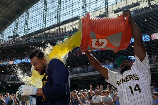 Perkins delivers winning hit as Brewers rally to beat Marlins 3-2 and avoid sweep