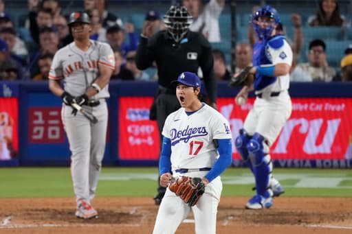 Ohtani throws 7 scoreless innings as Dodgers beat Giants 4-0 to end 4-game losing streak