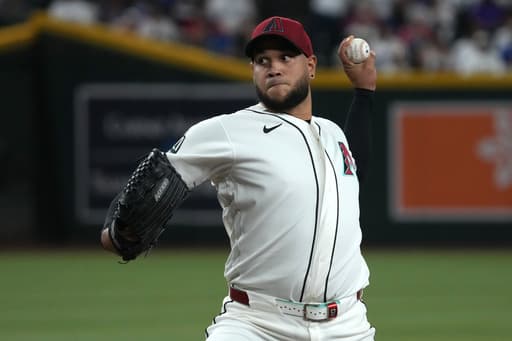 Marte and Arenado hit clutch homers to lift the Diamondbacks over the Dodgers 4-1