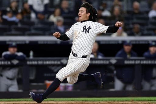 New York Yankees' Anthony Volpe runs home to be tagged out during the seventh inning of a baseball game against the Tampa Bay Rays, Thursday, Sept. 24, 2026, in New York. (AP Photo/Adam Hunger) (AP Photo/Adam Hunger)