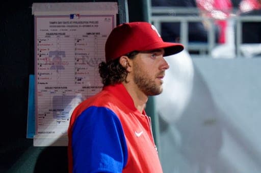 Philadelphia Phillies' Aaron Nola looks on from the dugout during the fifth inning of a baseball game against the Tampa Bay Rays, Saturday, Sept. 26, 2026, in Philadelphia. (AP Photo/Chris Szagola) (AP Photo/Chris Szagola)