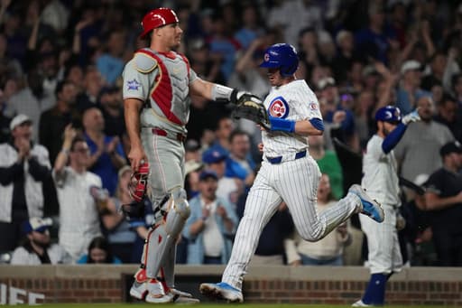 Struggling Phillies place catcher J.T. Realmuto on the 10-day IL with back spasms