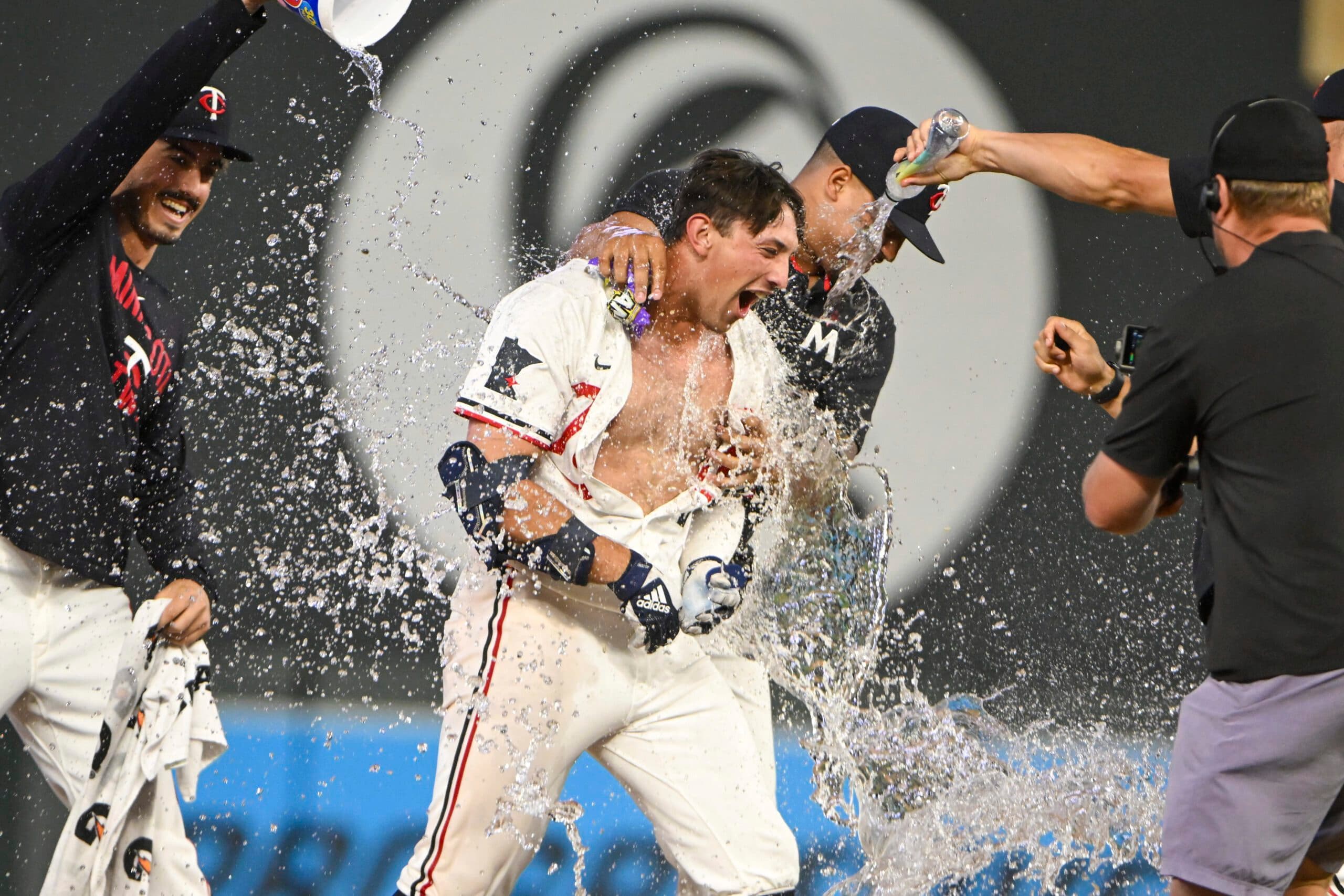 Twins top Red Sox 5-4 on 2-run single in 9th by Brooks Lee after 90-minute rain delay