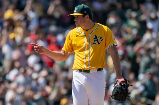 A’s catcher MacIver gets go-ahead hit, throws out runner to end game in big league debut at age 28