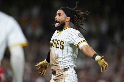 Fernando Tatis Jr.’s 10th-inning sacrifice fly lifts the Padres to a 4-3 win over the Reds