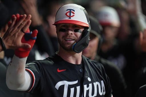 Minnesota Twins' Ryan Jeffers celebrates after hitting a three-run home run during the fifth inning of a baseball game against the Detroit Tigers, Monday, Aug. 31, 2026, in Minneapolis. (AP Photo/Abbie Parr) (AP Photo/Abbie Parr)