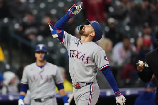 Rocker’s strong outing, Nimmo’s homer, lift Rangers over Rockies, 10-0