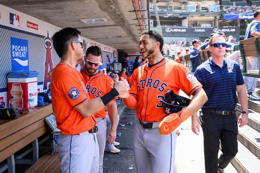Dubón hits 2 homers and Hader retires Trout to save Astros’ 8-7 win over Angels