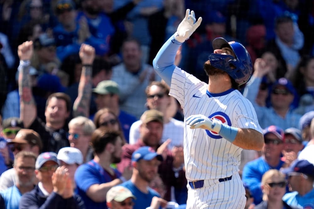 Cubs place SS Dansby Swanson on the injured list with a sprained right knee as OF Suzuki returns