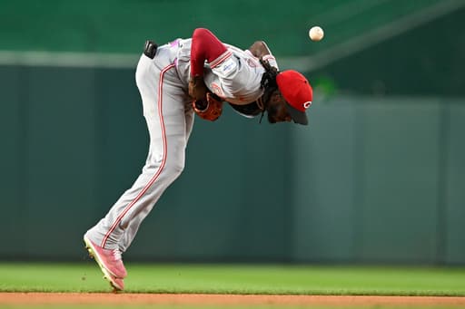 Lile and Ford homer to give the Nationals all their runs in a 5-3 victory over the Reds