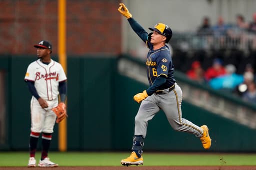 Collins hits 3-run homer, Priester stifles Braves in Brewers’ 3-1 win