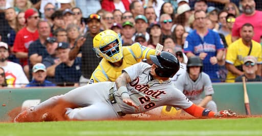 Tigers clinch AL playoff berth with 2-1 win over Red Sox. Detroit’s division hopes still alive