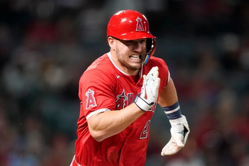 Angels star outfielder Mike Trout has knee surgery. Team expects 3-time MVP to return this season.