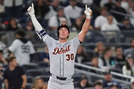 Tigers score 9 runs in 7th inning to trounce wild Yankees 12-2