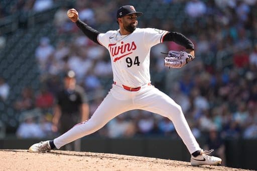 Minnesota Twins relief pitcher Yoendrys Gomez (94) delivers during the ninth inning of a baseball game against the Atlanta Braves, Wednesday, Aug. 19, 2026, in Minneapolis. (AP Photo/Abbie Parr) (AP Photo/Abbie Parr)
