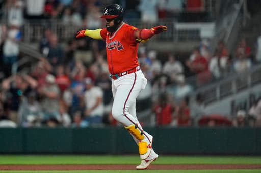 Ozuna and Harris hit 3-run homers to power Braves to 12-4 comeback win over struggling Rockies