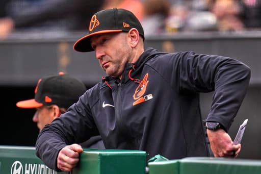 Orioles manager Craig Albernaz is OK after taking a line drive off his face