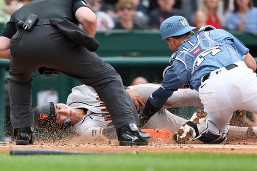 Giants escape a big jam in the 10th, outlast Nationals 7-6 in 12 innings