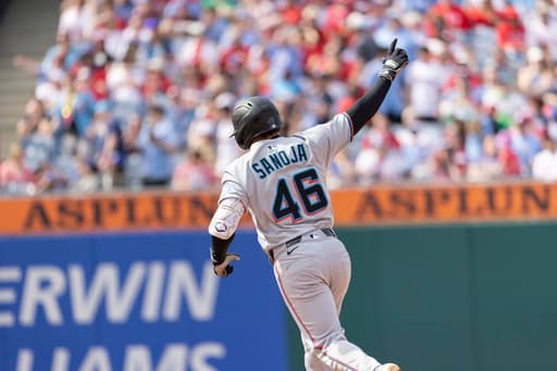Sanoja has 5 RBIs as Marlins rally to beat Phillies 7-5 in 10 innings