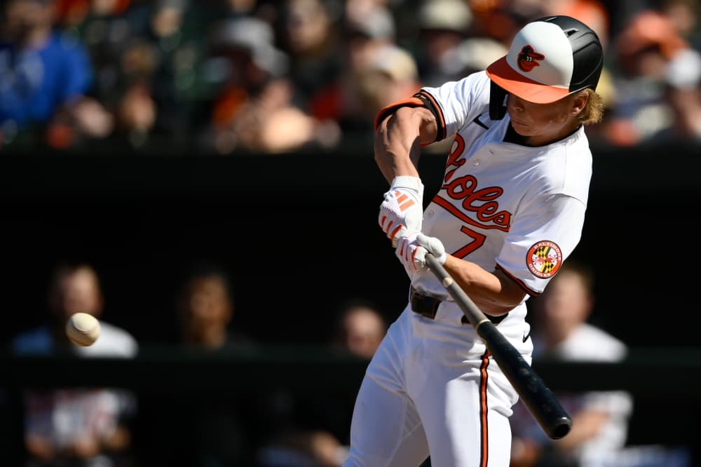 Much-needed Holliday: Orioles rookie comes through with first big league hit, sparks crucial rally