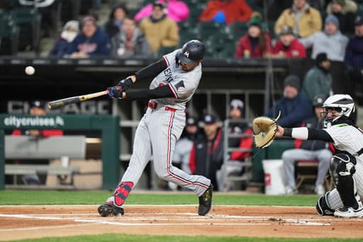 Miranda gets big hit as the Twins beat the White Sox 8-3 for their first win this season