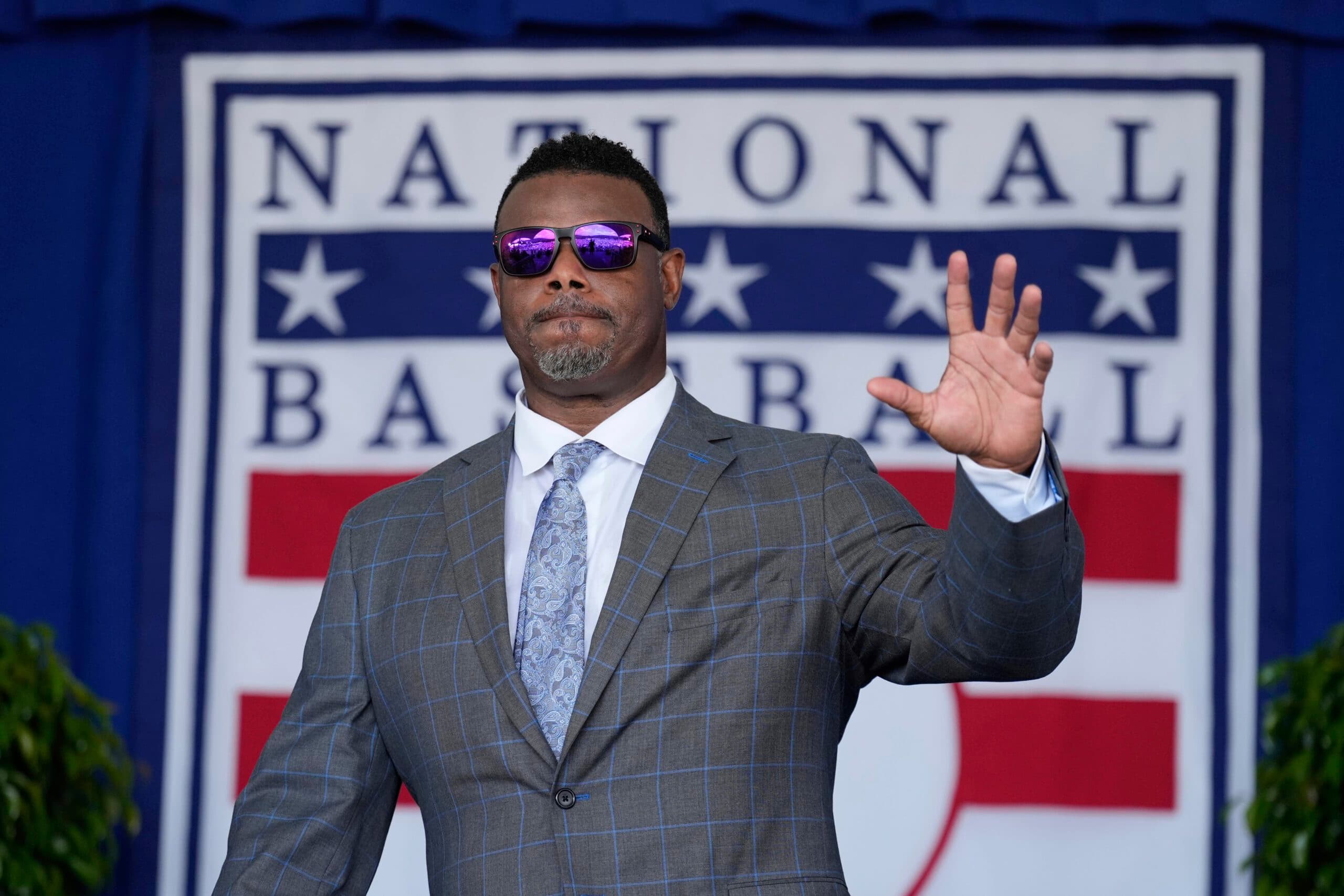 Hall of Famer Ken Griffey Jr. arrives on stage for the National Baseball Hall of Fame induction ceremony in Cooperstown, N.Y., Sunday, July 27, 2025. (AP Photo/Seth Wenig)