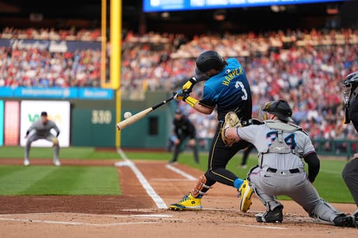 Harper and Schwarber hit home runs as Philadelphia beats Miami 7-2
