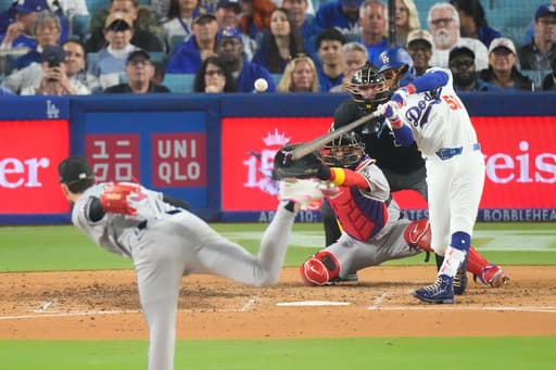Tucker’s 8th-inning single lifts Dodgers past Diamondbacks 5-4 on World Series ring night