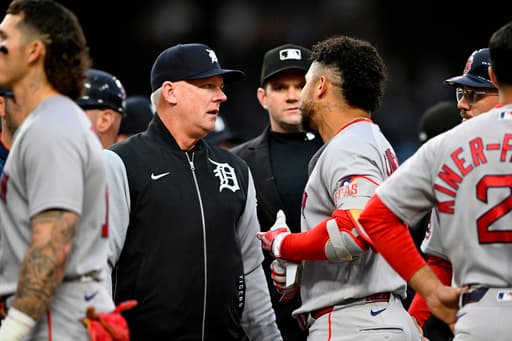 Rafaela homers and drives in four runs as the Red Sox rout the Tigers 10-3