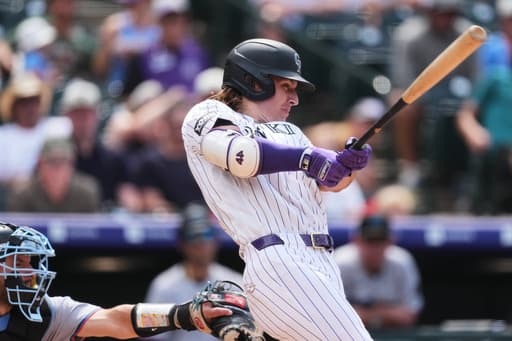 Rockies erupt for 14-4 win over the Marlins, fueled by a 7-run sixth