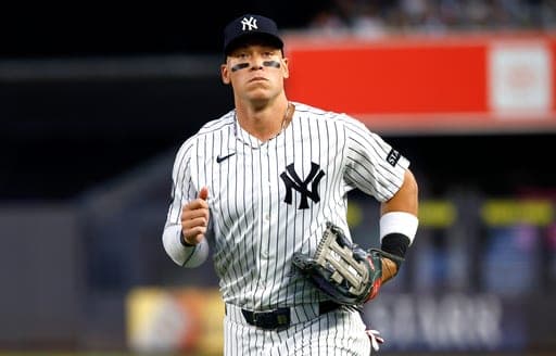 New York Yankees' Aaron Judge walks to the dugout during the first inning of a baseball game against the Colorado Rockies, Tuesday, Sept. 8, 2026, in New York. (AP Photo/Noah K. Murray) (AP Photo/Noah K. Murray)