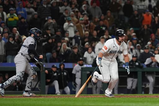 Scuffling 2025 AL MVP runner-up Cal Raleigh comes off the bench to help Mariners beat Yankees