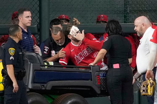 Angels’ Taylor Ward carted off field after crashing into scoreboard