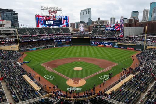 Twins endure a pregame power outage on a cold, rainy day to make for a happy home opener