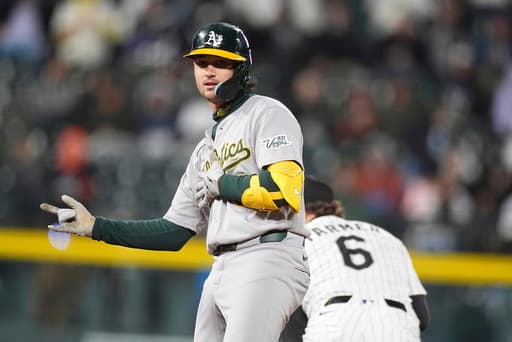 Wilson atones for hitting into triple play with 2-run double as Athletics beat reeling Rockies 7-4