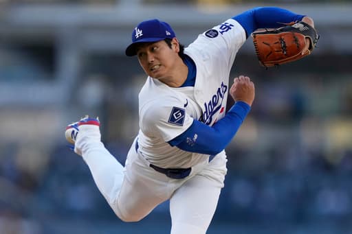Shohei Ohtani gets first victory with Dodgers, striking out season-high 9 against Reds