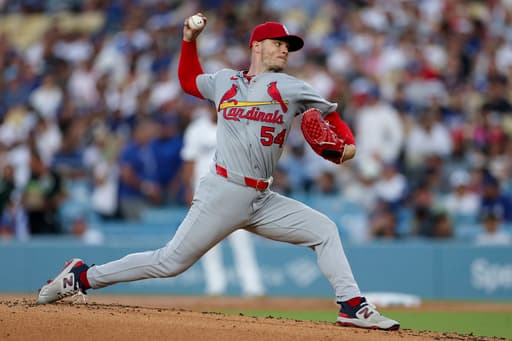 Yohel Pozo delivers pinch-hit RBI single in 9th inning to send Cardinals past Dodgers, 3-2