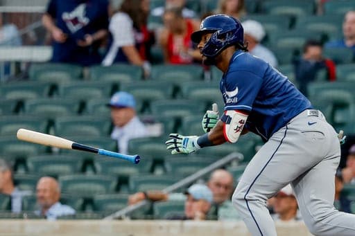 Tampa Bay Rays' Jorge Mateo flips his bat away after hitting a two-run single against the Atlanta Braves during the second inning of a baseball game, Wednesday, Sept. 9, 2026, in Atlanta. (AP Photo/Erik S. Lesser) (AP Photo/Erik S. Lesser)