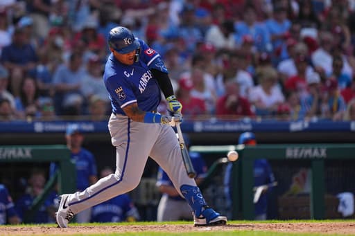Phillies clinch fourth straight playoff berth despite 10-3 loss to Royals, who get 5 RBIs from Perez