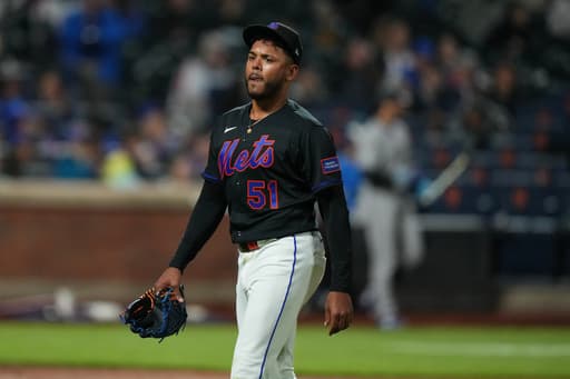 Rockies-Mets game is postponed by rain, setting up a doubleheader on Sunday